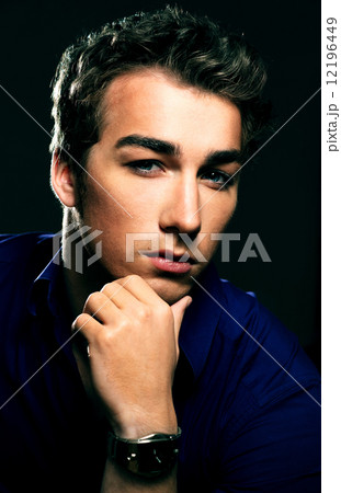 Closeup portrait of a handsome young man 12196449