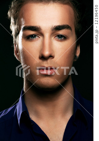 Closeup portrait of a handsome young man 12196450