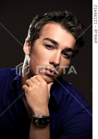 Closeup portrait of a handsome young man 12196452