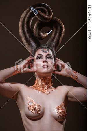 Beautiful girl with a strange haircut in the style of evil 12196453