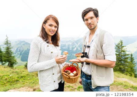 Young mushroom pickers in the Bavarian alps Young mushroom pickers in the Bavarian alps 12198354