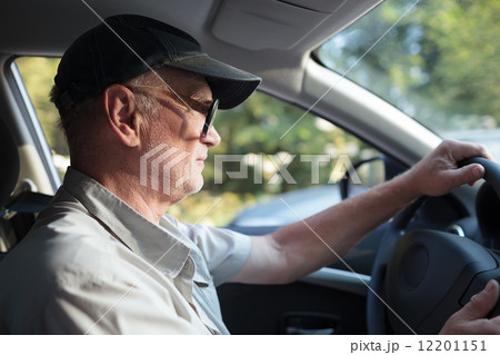 Senior man at the wheel Senior man at the wheel 12201151