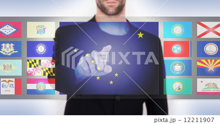 Hand pushing on a touch screen interface Hand pushing on a touch screen interface 12211907