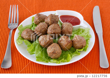 meatballs  on the plate with sauce 12217756