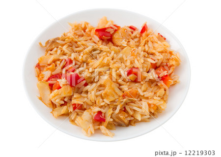rice with codfish and vegetables on the plate 12219303