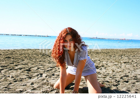 Woman on beach Woman on beach 12225641