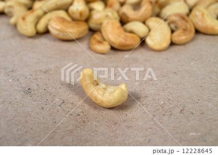 One roasted cashew and cachews on background 12228645