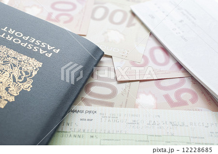 Canada passport with boarding pass on the table 12228685