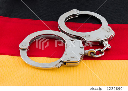 Handcuffs on German Flag 12228904