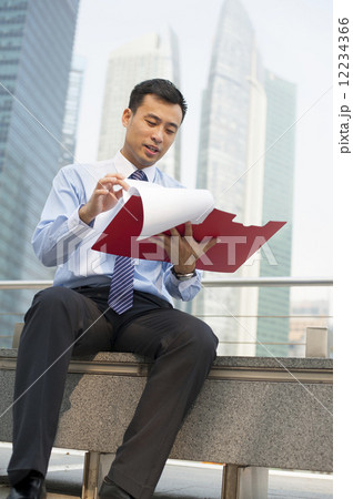Business executive in a financial district. Business executive in a financial district. 12234366
