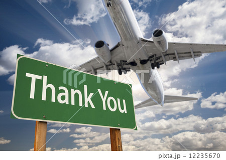 Thank You Green Road Sign and Airplane Above Thank You Green Road Sign and Airplane Above 12235670