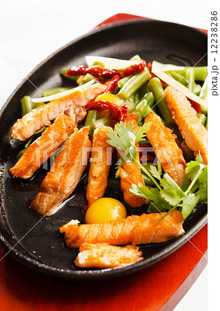 fried salmon with vegetables 12238286