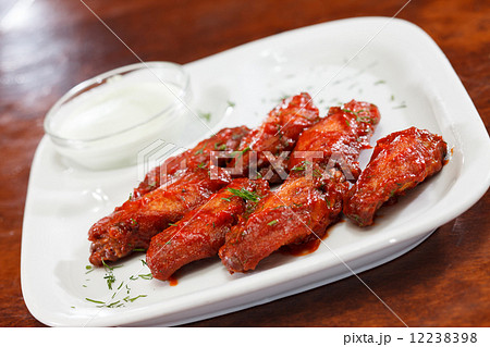 Chicken wings with sauce Chicken wings with sauce 12238398