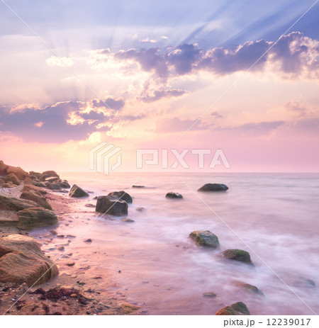 Dawn sunrise landscape over beautiful rocky coastline in the Sea 12239017