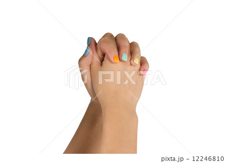clasped female hands with colorful nails isolated on white background 12246810