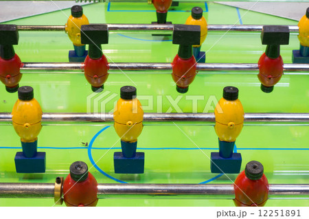 Table football game with yellow and red players 12251891