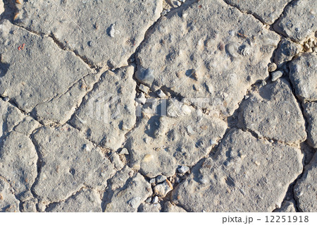 Detailed macro cracked cement road surface 12251918