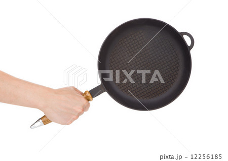 Hand holding a pan Hand holding a pan 12256185