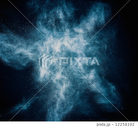 Blue powder exploding isolated on black Blue powder exploding isolated on black 12258102