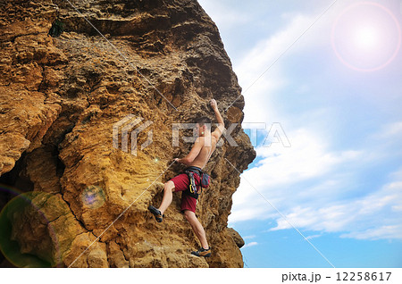Tourist climbing 12258617