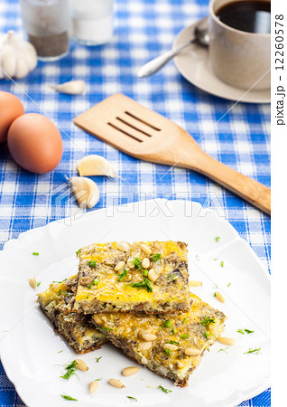 Delicious omlette with sardines and pine seeds Delicious omlette with sardines and pine seeds 12260578