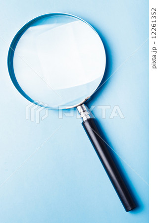 Magnifier on white 12261352