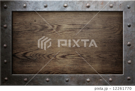 old metal frame over wooden background 12261770
