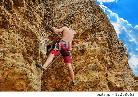 Guy climbing Guy climbing 12263063