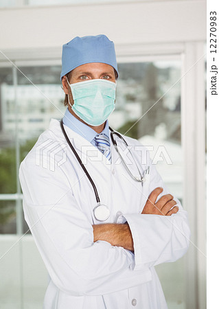 Doctor wearing surgical mask in hospital Doctor wearing surgical mask in hospital 12270983