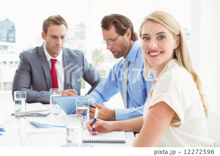 Business people in board room meeting 12272596