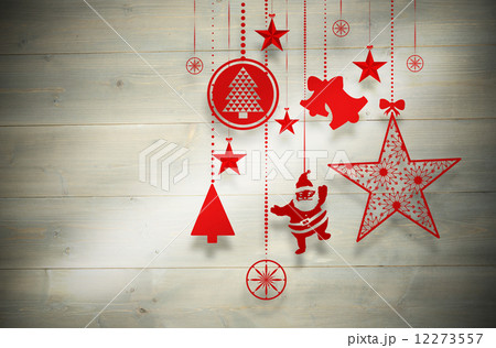 Composite image of hanging christmas decorations 12273557