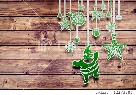 Composite image of hanging christmas decorations 12273580