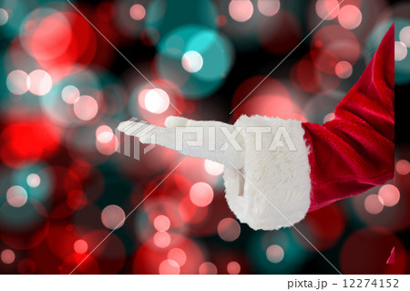 Composite image of santa claus presenting with hand Composite image of santa claus presenting with hand 12274152