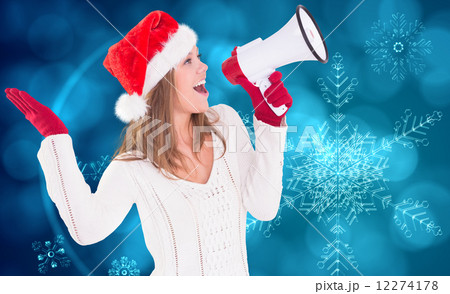 Composite image of festive blonde shouting through megaphone Composite image of festive blonde shouting through megaphone 12274178