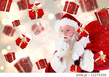 Composite image of santa claus carrying sack 12274308