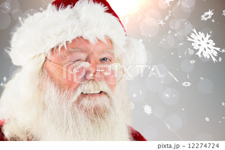 Composite image of santa claus winking Composite image of santa claus winking 12274724