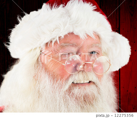 Composite image of santa claus winking Composite image of santa claus winking 12275356