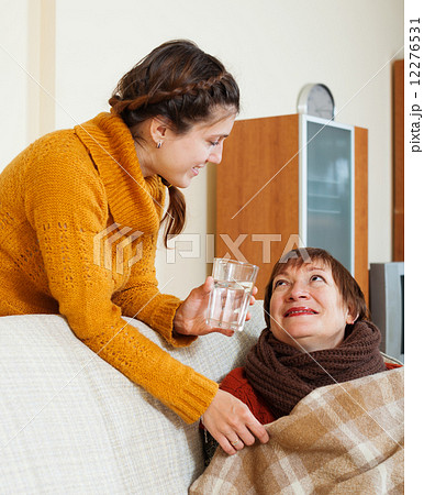 daughter caring for unwell mother 12276531