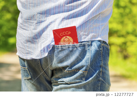 Man with soviet union passport in pocket  12277727