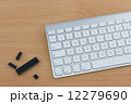 Keyboard and Computer Parts on Desk 12279690