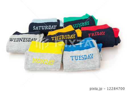 Isolated wool socks with days inscriptions Isolated wool socks with days inscriptions 12284700