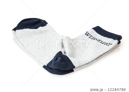 Isolated wool socks with inscription WEDNESDAY 12284780