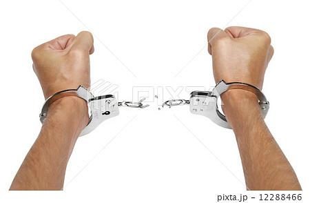 Hands and breaking handcuffs 12288466