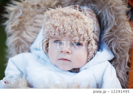 Little baby boy in warm winter clothes outdoor Little baby boy in warm winter clothes outdoor 12291495