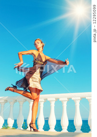 fashion model by the sea in Greece 12295099