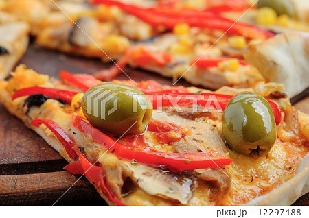 Pizza with Mozzarella, Mushrooms, Olives and Tomato Sauce 12297488