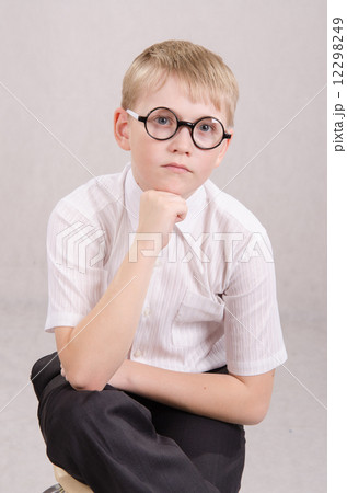 Portrait a boy of twelve glasses 12298249