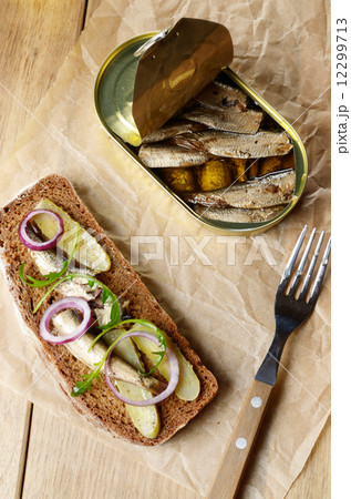 Sprat sandwich with pickled vegetables Sprat sandwich with pickled vegetables 12299713
