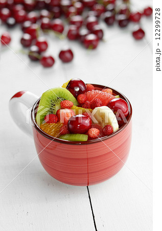 Red cup with fruits 12299728