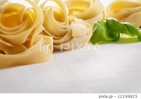 Raw pasta tagliatelle Raw pasta tagliatelle 12299825